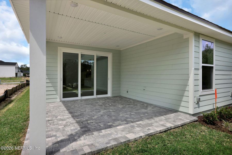 Exterior details and patio area of a home in Seabrook Village at Seabrook, Nocatee (Image 31).