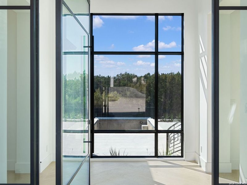 Exterior details and patio area of a home in , San Antonio (Image 33).