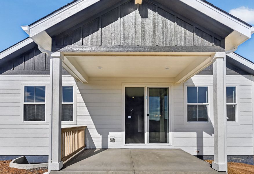 Exterior details and patio area of a home in The Aurora Highlands, Aurora (Image 3).