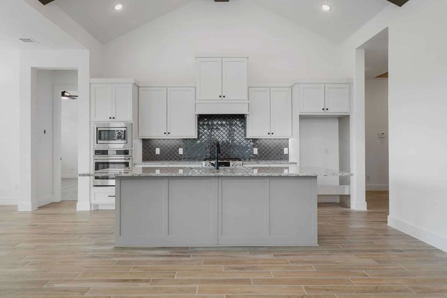 Representative furnished interior of a home built from the Malibu by Chesmar Homes in Fulshear Lakes, Fulshear (Image 8).