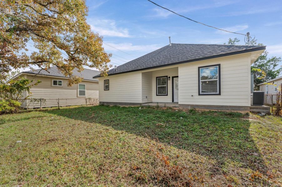 Covered patio area in the rear of the home.