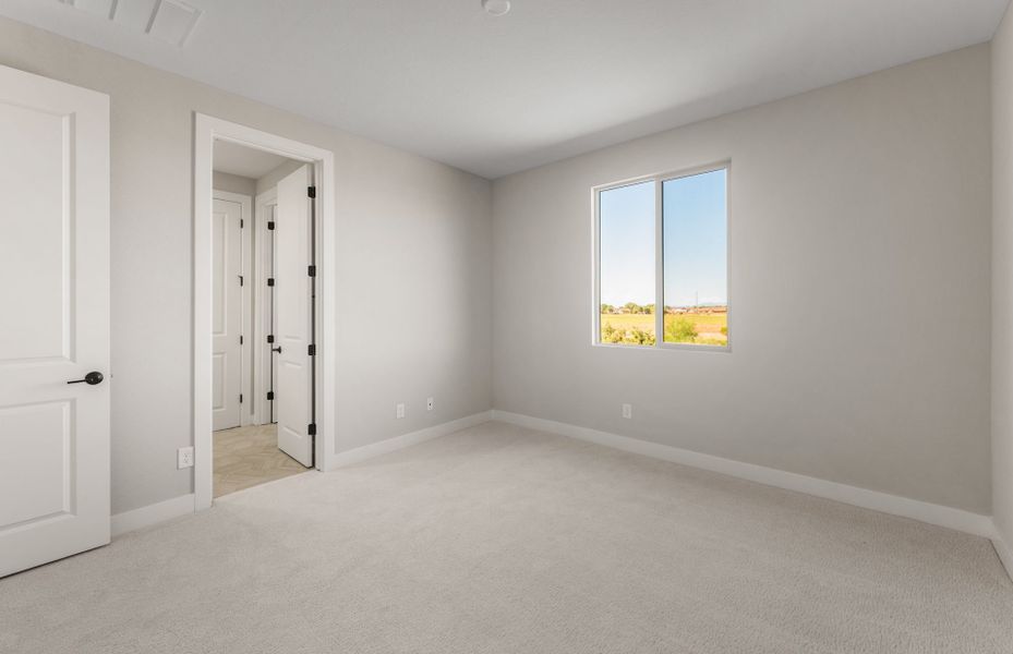 Spacious, unfurnished interior of a new home in Legado West, Queen Creek (Image 27).