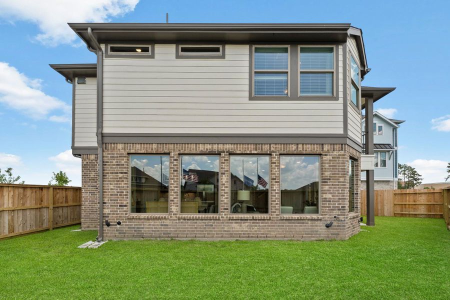 Exterior details and patio area of a home in Balmoral, Atascocita (Image 22).
