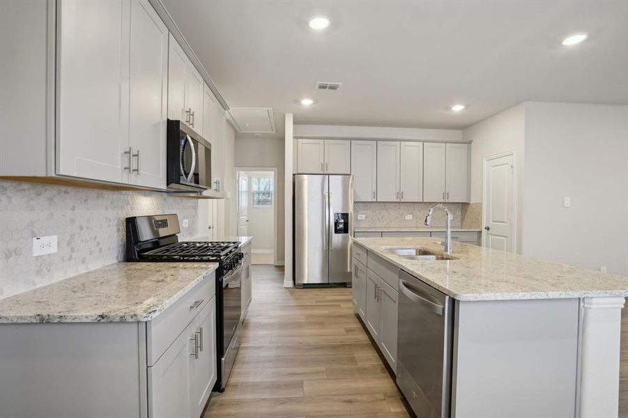 Photo is not of the actual home, but is an inspirational photo of builder’s model home and may depict options, furnishings, and/or decorator features that are not included.