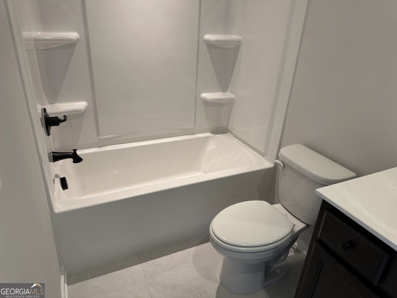 Furnished interior view inside a new home in Millstone at Mundy Mill, Gainesville (Image 30). Furnished interior view inside a new home in Millstone at Mundy Mill, Gainesville (Image 30).