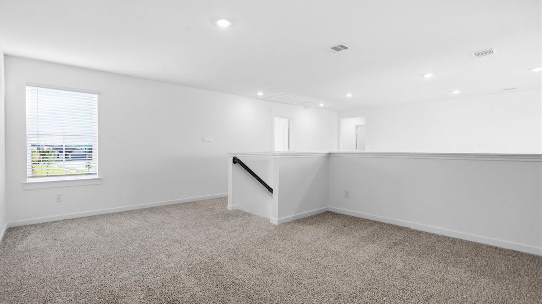 Representative unfurnished interior of a home built from the Texoma by D.R. Horton in Watermark, Alvin (Image 25). Representative unfurnished interior of a home built from the Texoma by D.R. Horton in Watermark, Alvin (Image 25).