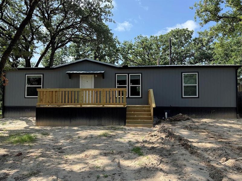 Exterior details and patio area of a home in , Pelican Bay (Image 12).