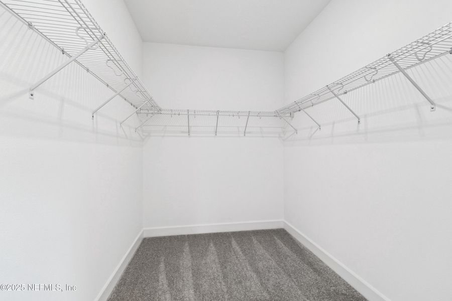 Spacious, unfurnished interior of a new home in Evergreen Island at Silverleaf - Classic, St. Augustine (Image 20).