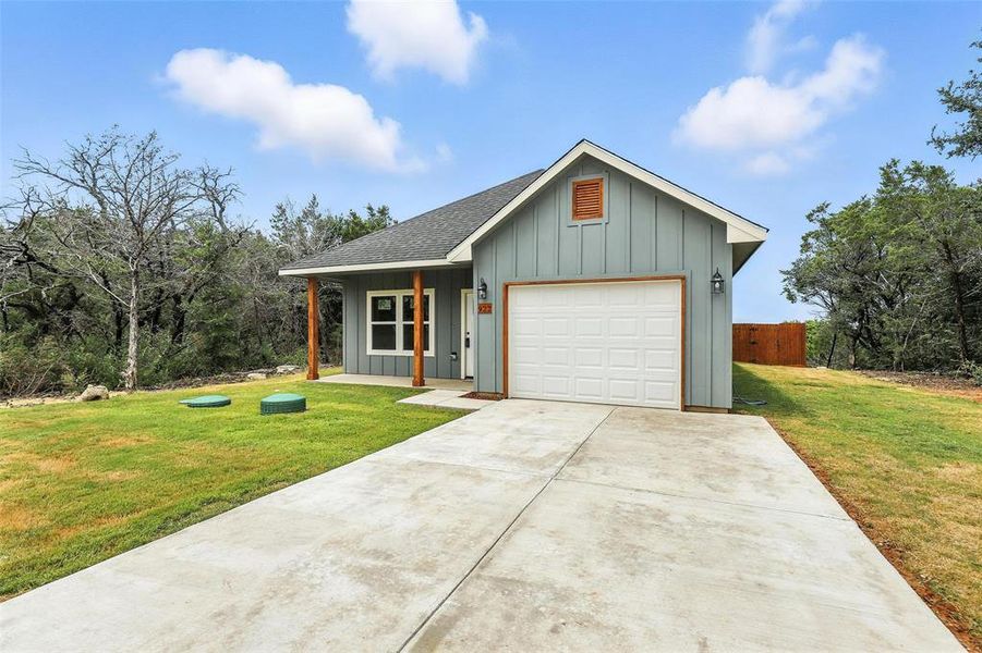 Front exterior of a new home in , Granbury, TX, highlighting curb appeal (Image 17). Front exterior of a new home in , Granbury, TX, highlighting curb appeal (Image 17).