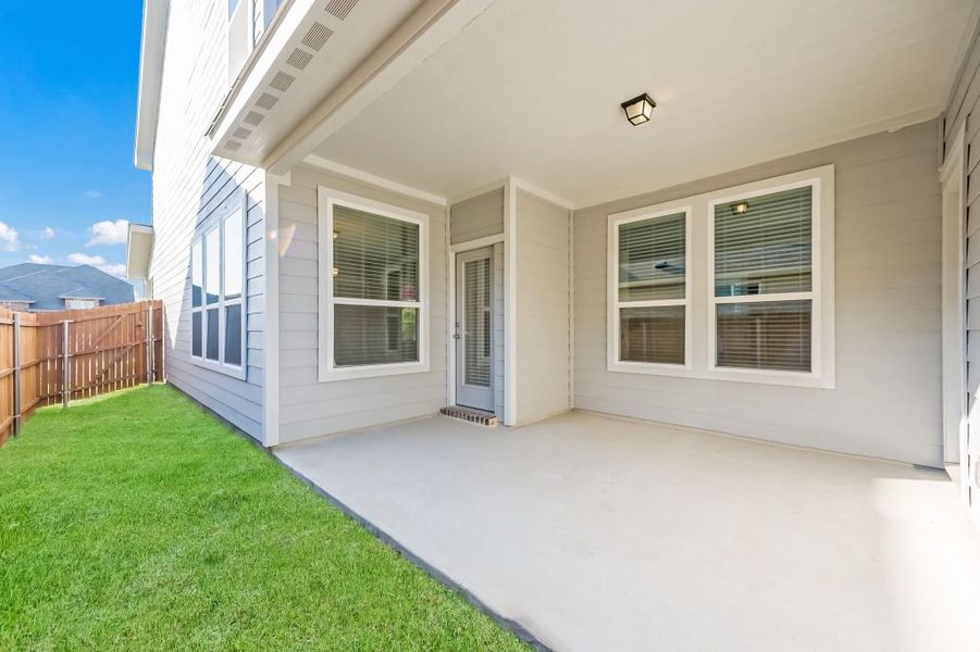 Representative exterior photo of a completed home built from the Marion by Impression Homes in Heartland, Heartland, TX (Image 27). Representative exterior photo of a completed home built from the Marion by Impression Homes in Heartland, Heartland, TX (Image 27).