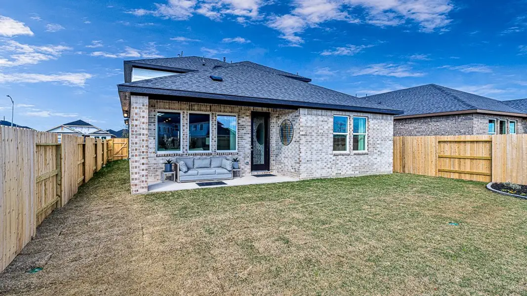 Exterior details and patio area of a home in Bridge Creek 45s and 50s, Cypress (Image 3).