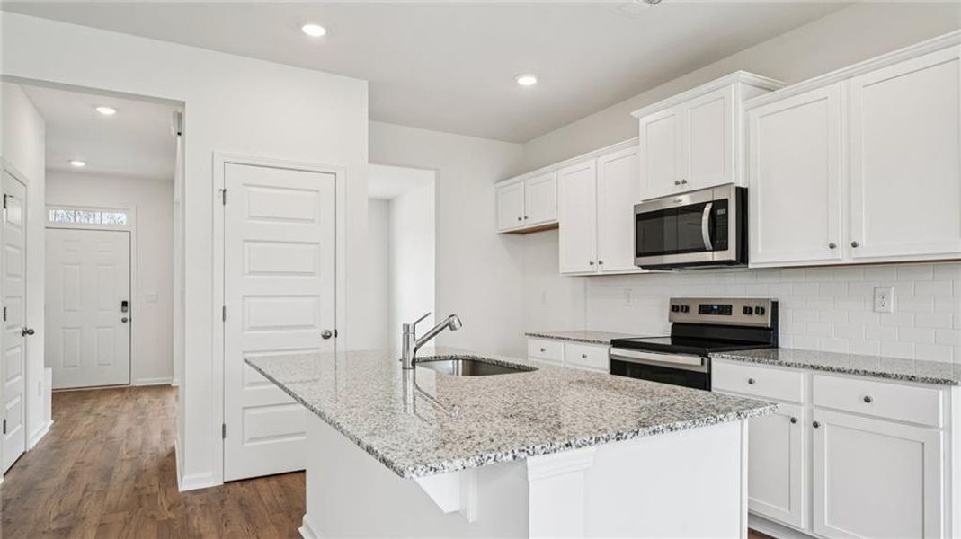 Furnished interior view inside a new home in Sherwood Manor, College Park (Image 7).
