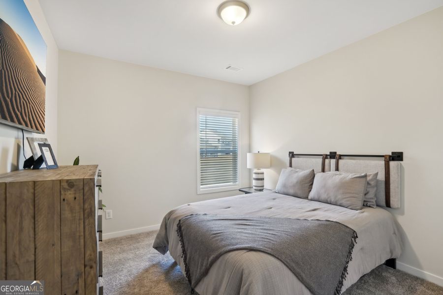 Furnished interior view inside a new home in Ponderosa Farms Reserve, Gainesville (Image 13).