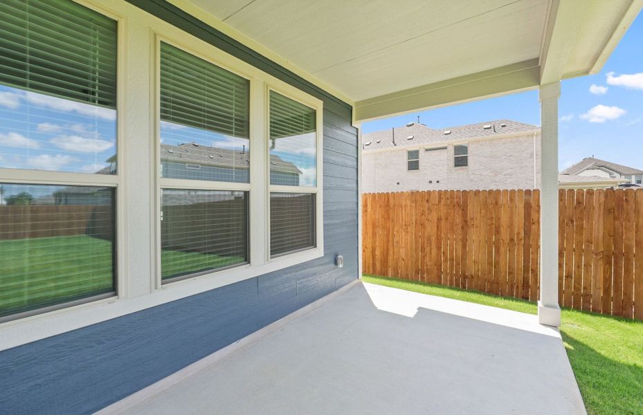 Exterior details and patio area of a home in Santa Rita Ranch, Liberty Hill (Image 30).