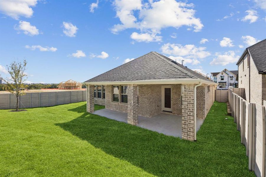 Exterior details and patio area of a home in Painted Tree - Woodland West, McKinney (Image 3).