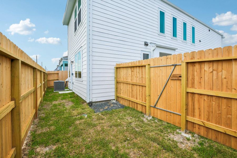 Exterior details and patio area of a home in Kemah Crossing - City Series, Kemah (Image 3).