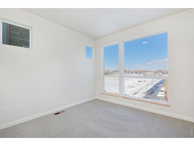 Spacious, unfurnished interior of a new home in West Grange, Longmont (Image 14).