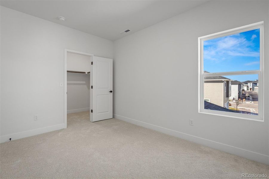 Spacious, unfurnished interior of a new home in Revel Crossing at Wolf Ranch – The Outlook Collection, Colorado Springs (Image 21).