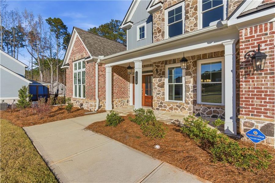 Exterior details and patio area of a home in Ford Landing, Acworth (Image 4).