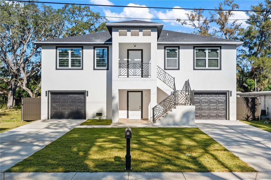 Front exterior of a new home in , New Port Richey, FL, highlighting curb appeal (Image 2).