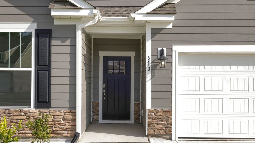 Exterior details and patio area of a home in Reserve at Tap Root Farms, Fletcher (Image 2). Exterior details and patio area of a home in Reserve at Tap Root Farms, Fletcher (Image 2).