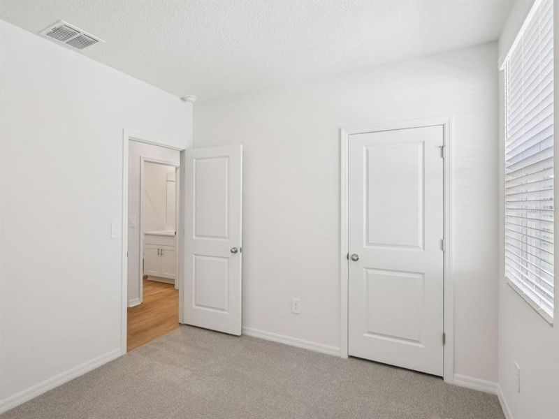 Spacious, unfurnished interior of a new home in Coasterra - Premier Series, Palmetto (Image 18).