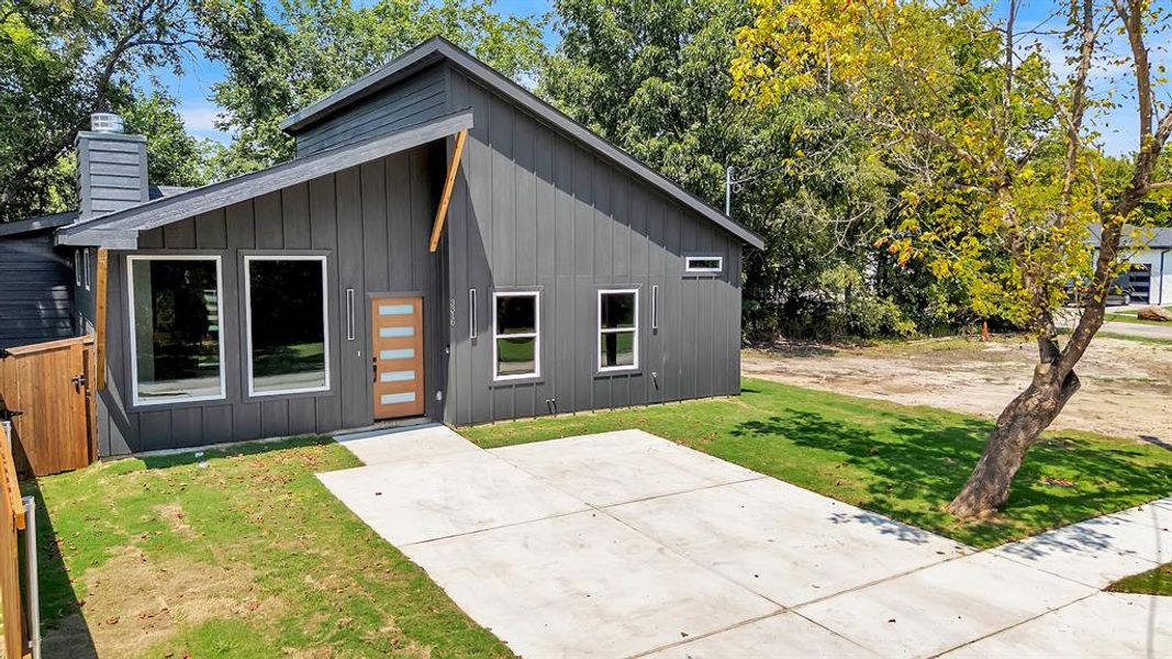 Front exterior of a new home in , Greenville, TX, highlighting curb appeal (Image 16). Front exterior of a new home in , Greenville, TX, highlighting curb appeal (Image 16).