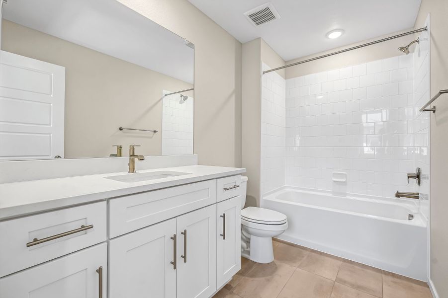 Furnished interior view inside a new home in Barefoot Village, Firestone (Image 8).