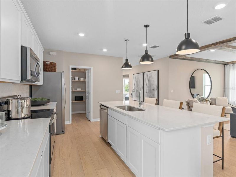 Furnished interior view inside a new home in EverBe, Orlando (Image 6).