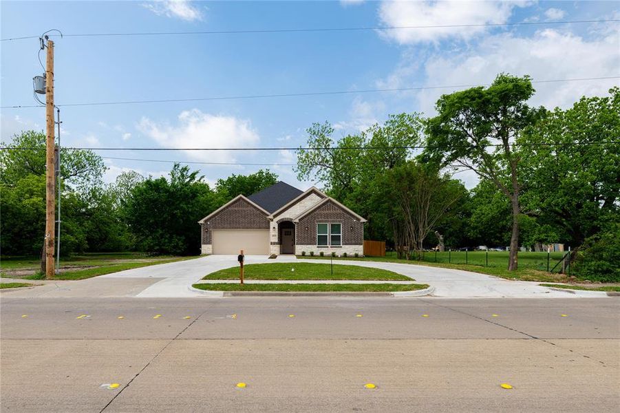 Front exterior of a new home in , Garland, TX, highlighting curb appeal (Image 18).