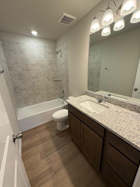 Furnished interior view inside a new home in Southern Pointe, College Station (Image 4).