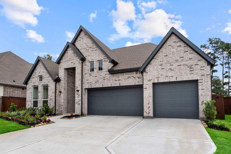 Front exterior of a new home in Briarley, Montgomery, TX, highlighting curb appeal (Image 23). Front exterior of a new home in Briarley, Montgomery, TX, highlighting curb appeal (Image 23).