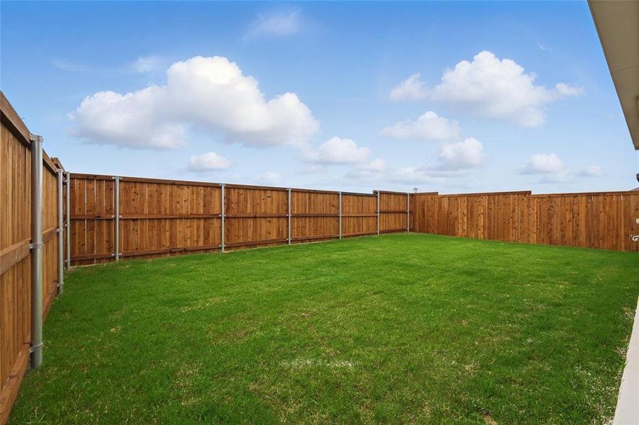 Exterior details and patio area of a home in Bel Air Village, Sherman (Image 20).