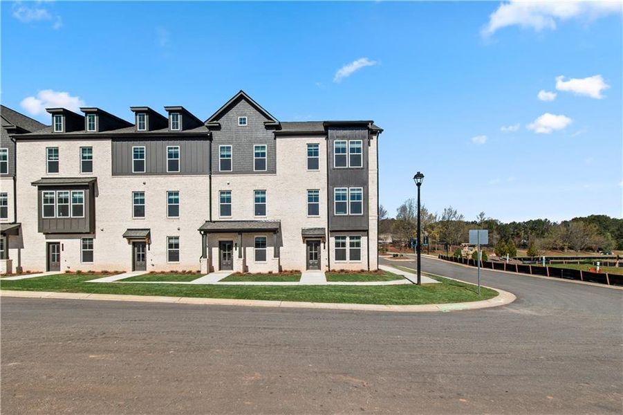 Front exterior of a new home in Daybreak, Newnan, GA, highlighting curb appeal (Image 26).