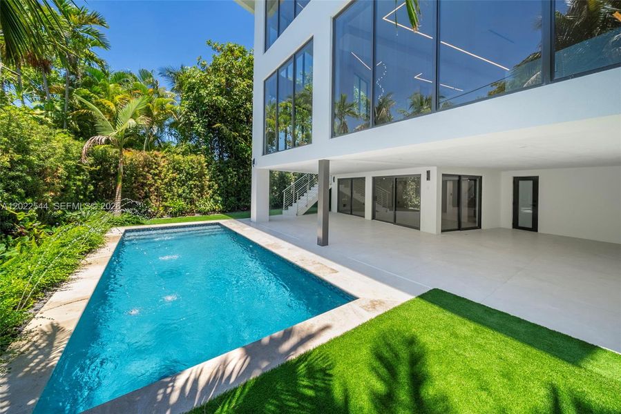 Exterior details and patio area of a home in , Miami (Image 24). Exterior details and patio area of a home in , Miami (Image 24).