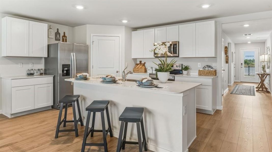 Furnished interior view inside a new home in Coral Lakes - Tradition & Express, Punta Gorda (Image 16).