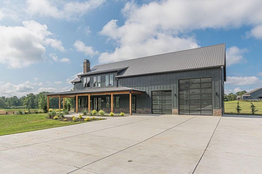 Front exterior of a new home in , Bremen, GA, highlighting curb appeal (Image 24). Front exterior of a new home in , Bremen, GA, highlighting curb appeal (Image 24).