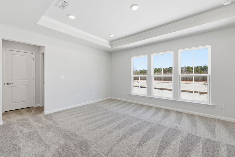 Spacious, unfurnished interior of a new home in Poets Walk, Whitsett (Image 25).