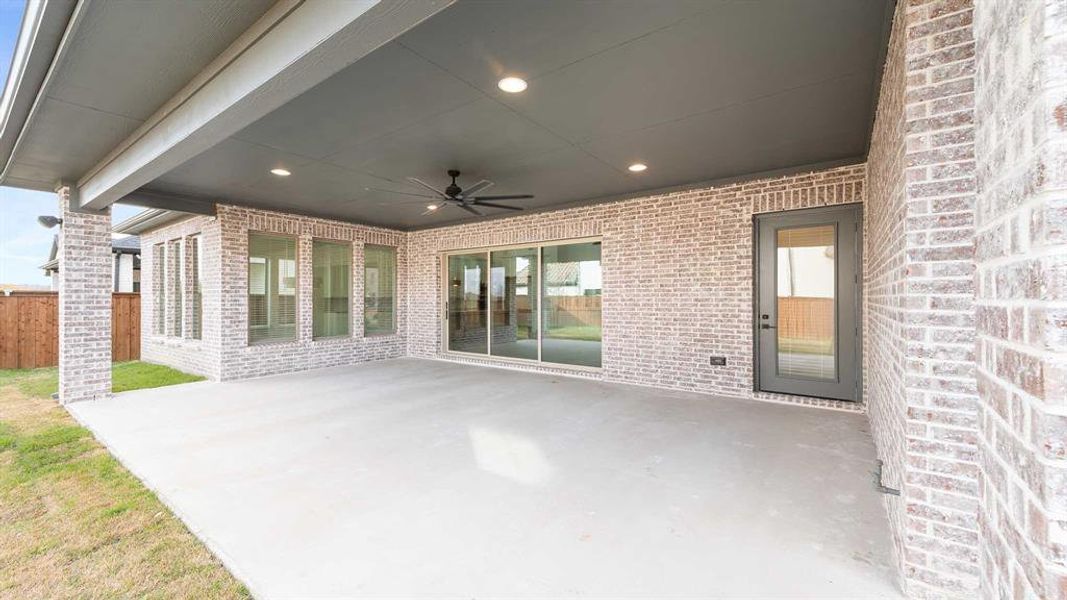 View of patio with ceiling fan