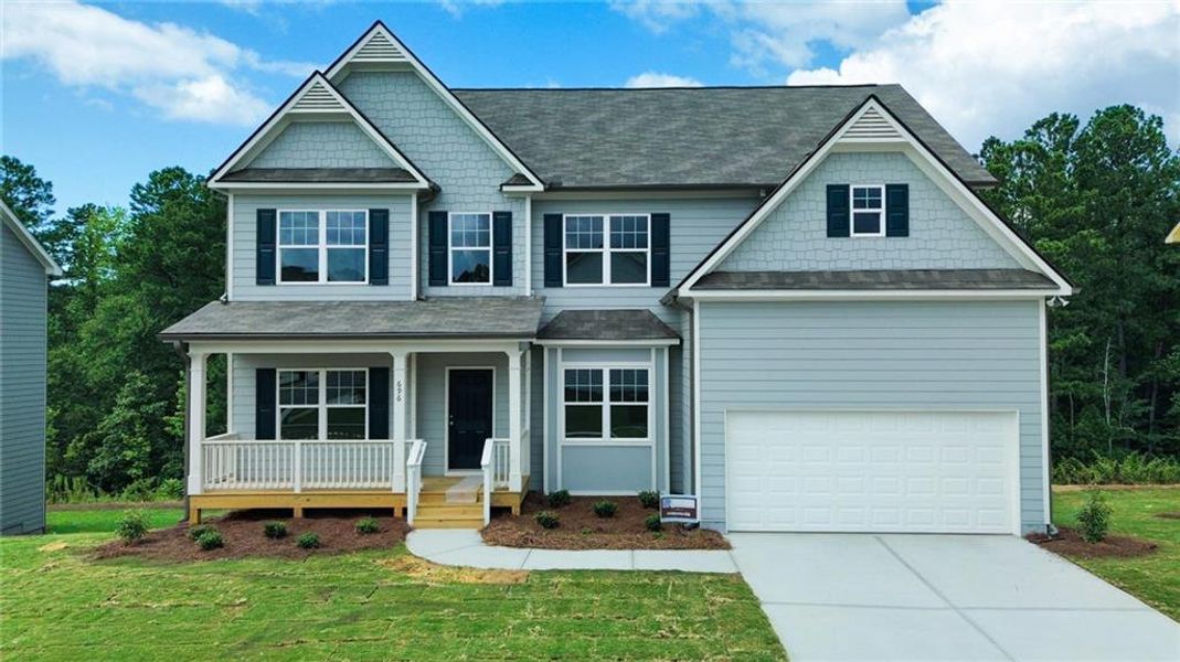 Front exterior of a new home in Creekside Landing, Dallas, GA, highlighting curb appeal (Image 1).