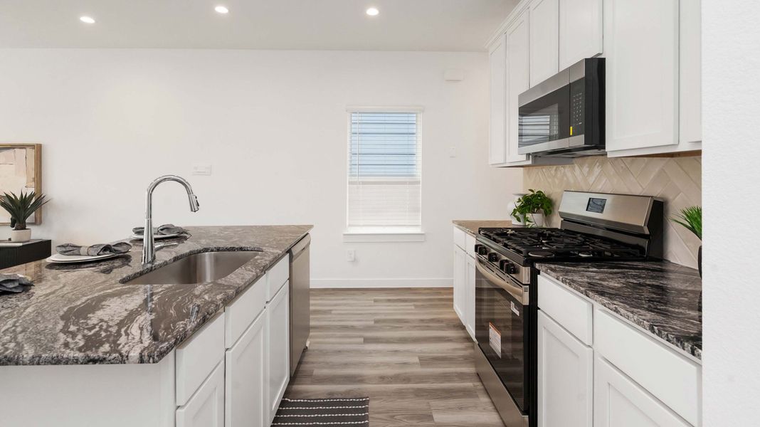 Representative furnished interior of a home built from the Hibiscus by D.R. Horton in Grand West, Houston (Image 9). Representative furnished interior of a home built from the Hibiscus by D.R. Horton in Grand West, Houston (Image 9).