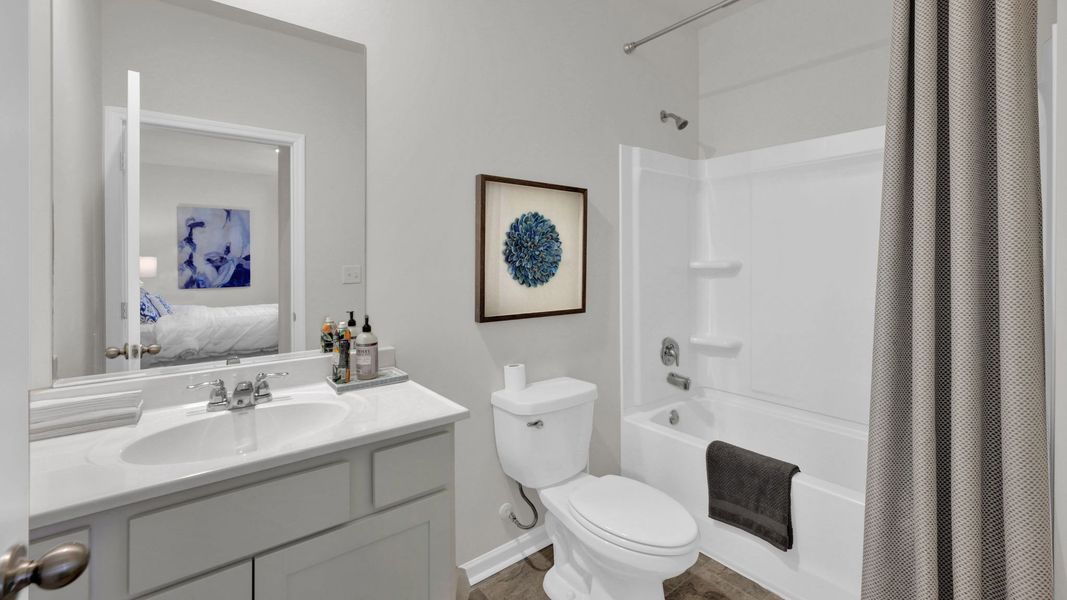 Representative furnished interior of a home built from the Mansfield by D.R. Horton in The Hideaway at Fox Meadows, Bluff City (Image 26).