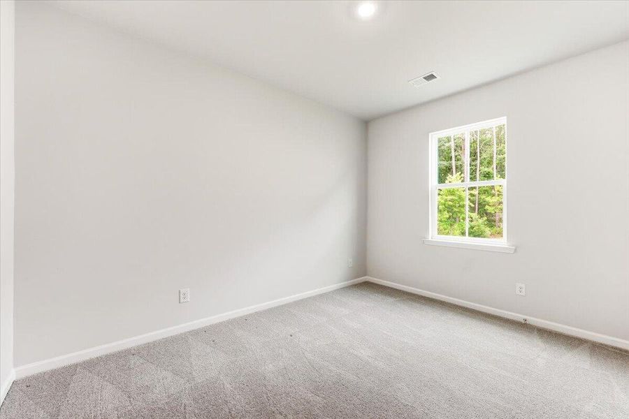 Spacious, unfurnished interior of a new home in Limehouse Village: Arbor Series, Summerville (Image 59).
