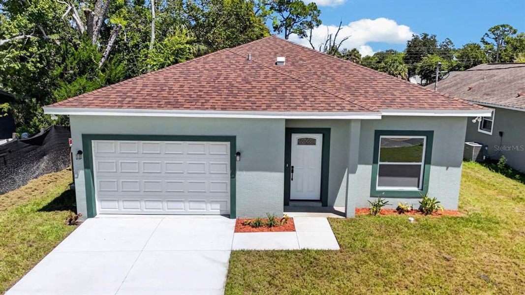 Front exterior of a new home in , Daytona Beach, FL, highlighting curb appeal (Image 22). Front exterior of a new home in , Daytona Beach, FL, highlighting curb appeal (Image 22).