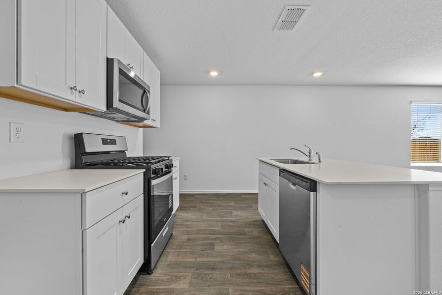 Furnished interior view inside a new home in Riverstone at Westpointe, San Antonio (Image 6).
