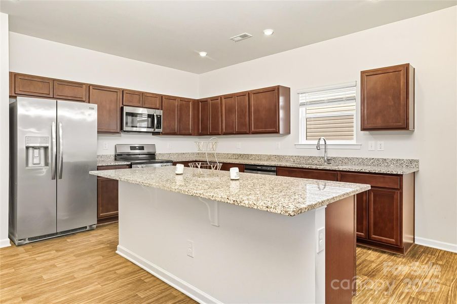 Furnished interior view inside a new home in Orchard Creek, Charlotte (Image 8).