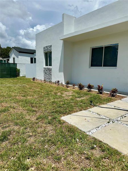 Front exterior of a new home in , Miami, FL, highlighting curb appeal (Image 2). Front exterior of a new home in , Miami, FL, highlighting curb appeal (Image 2).