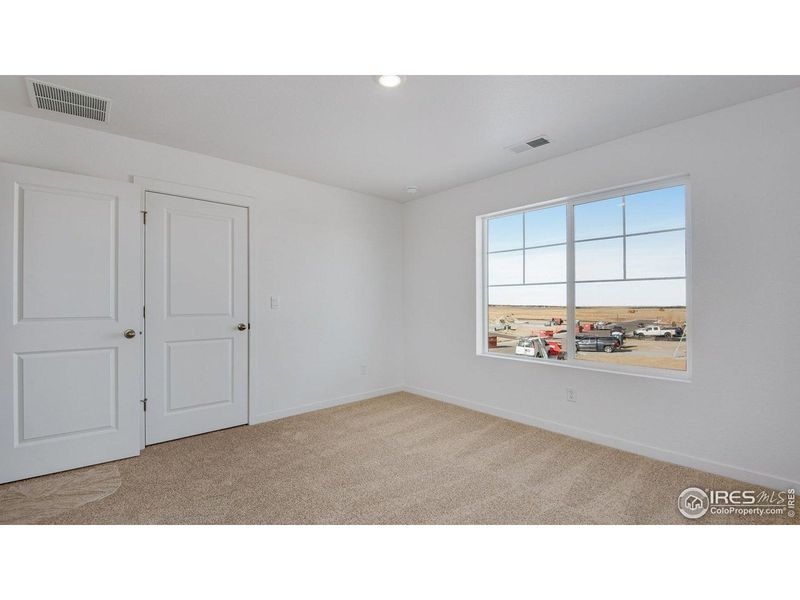 Spacious, unfurnished interior of a new home in Vista Meadows, Fort Lupton (Image 28).