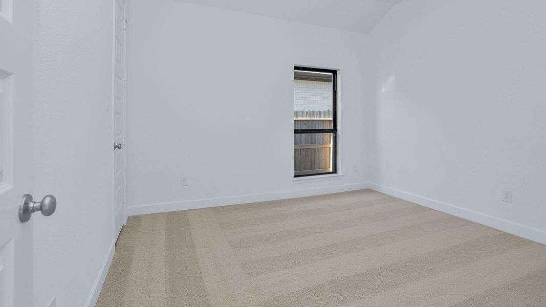 Spacious, unfurnished interior of a new home in Artavia 55' - Valencia, Conroe (Image 12).