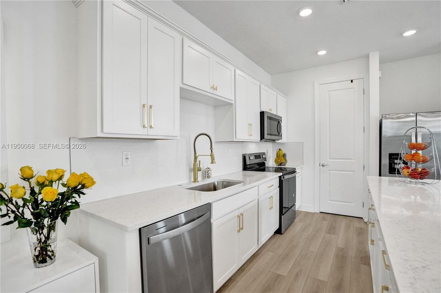 Furnished interior view inside a new home in , Plantation (Image 48).